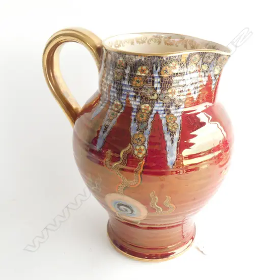 A Crown Devon jug, red lustre